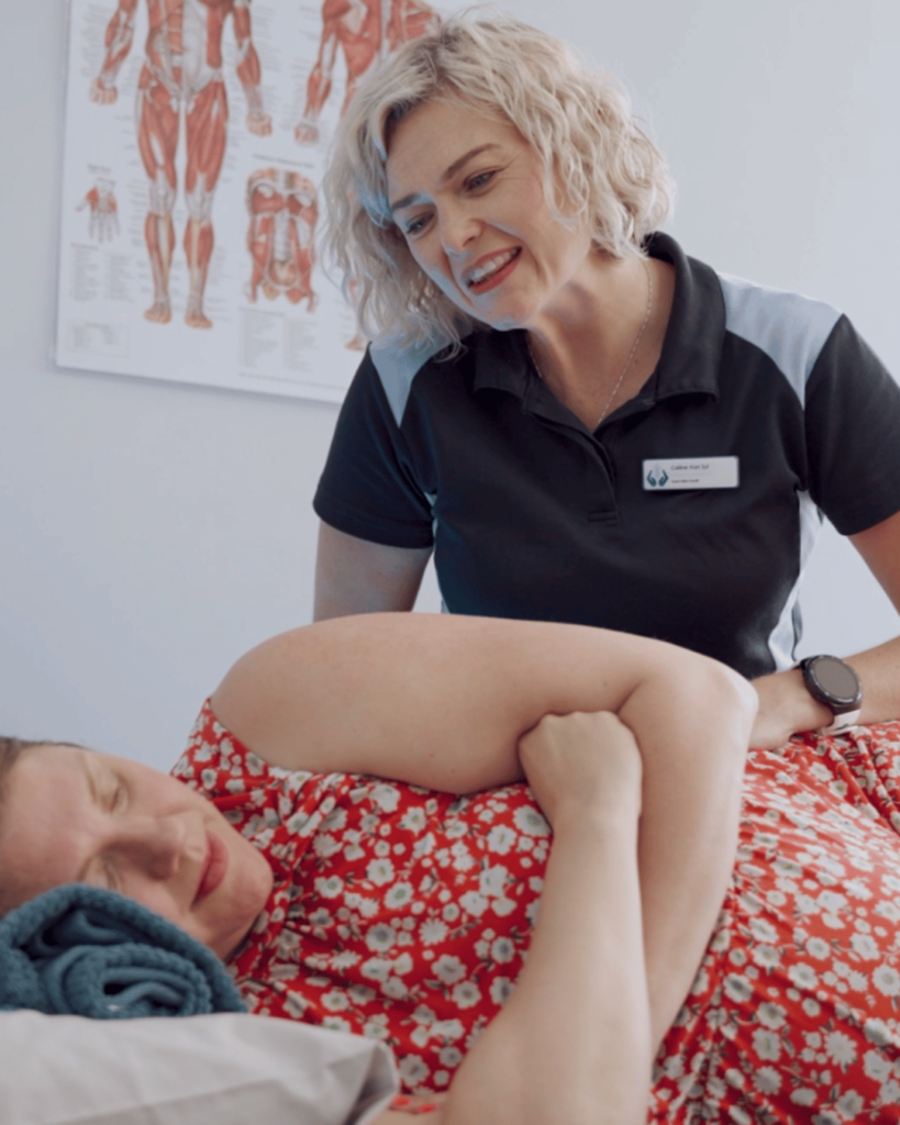Assist Allied Health physiotherapist addressing back pain in a pregnant client, demonstrating care and experience.